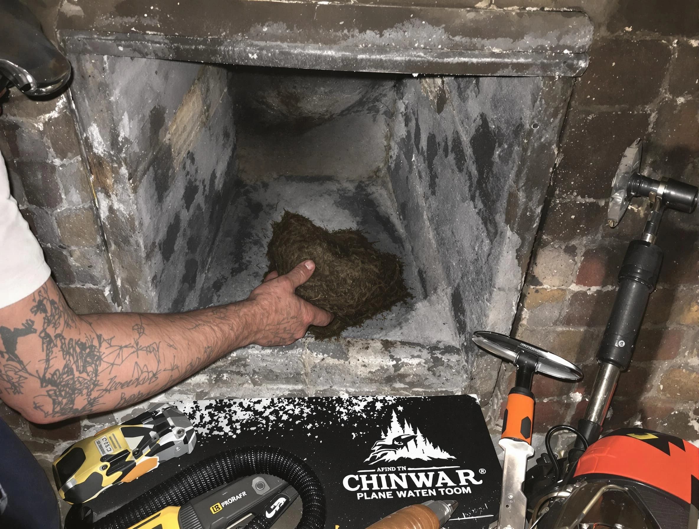 Millcreek Chimney Sweep safely removing debris and screening chimney in Millcreek, UT